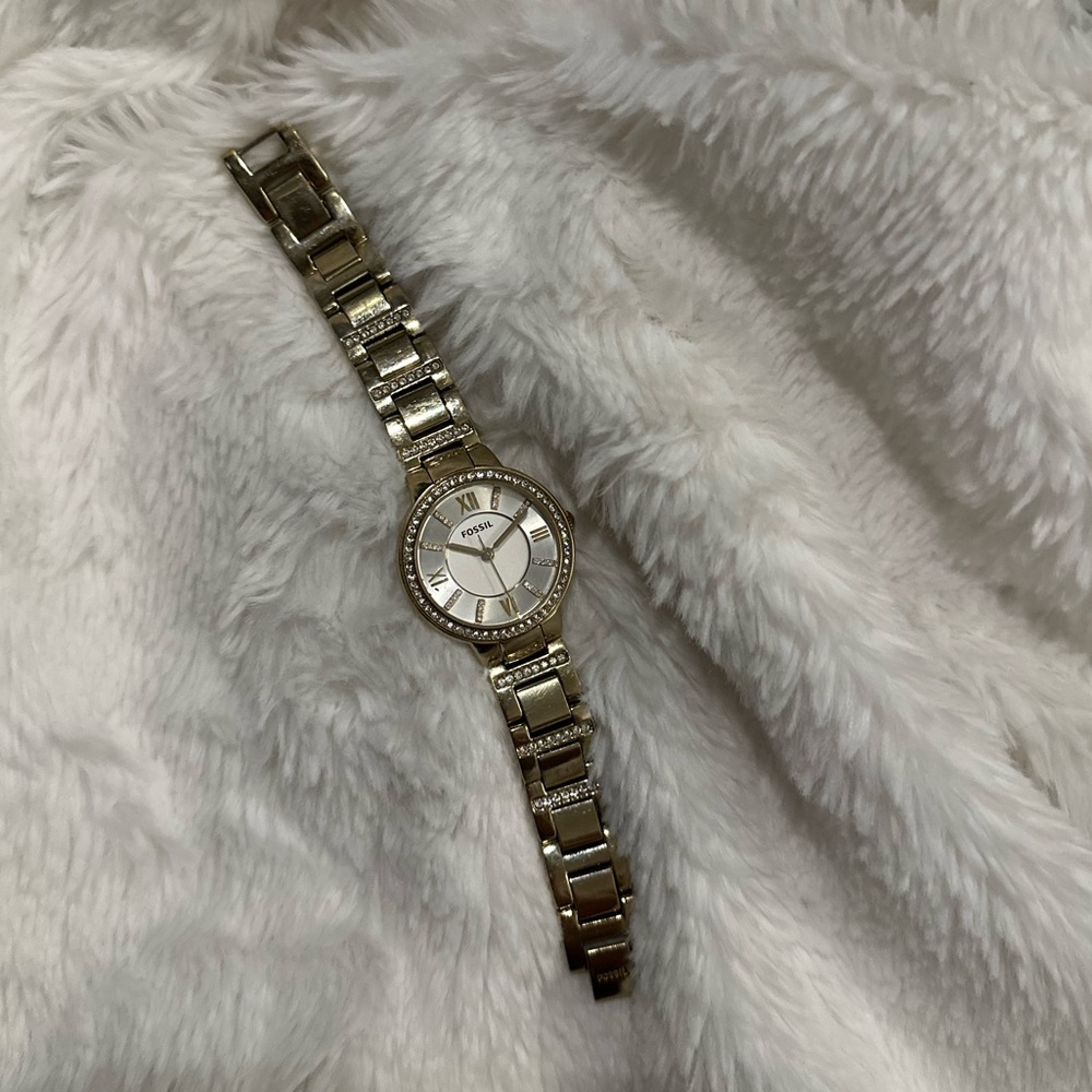 Thin gold fossil watch